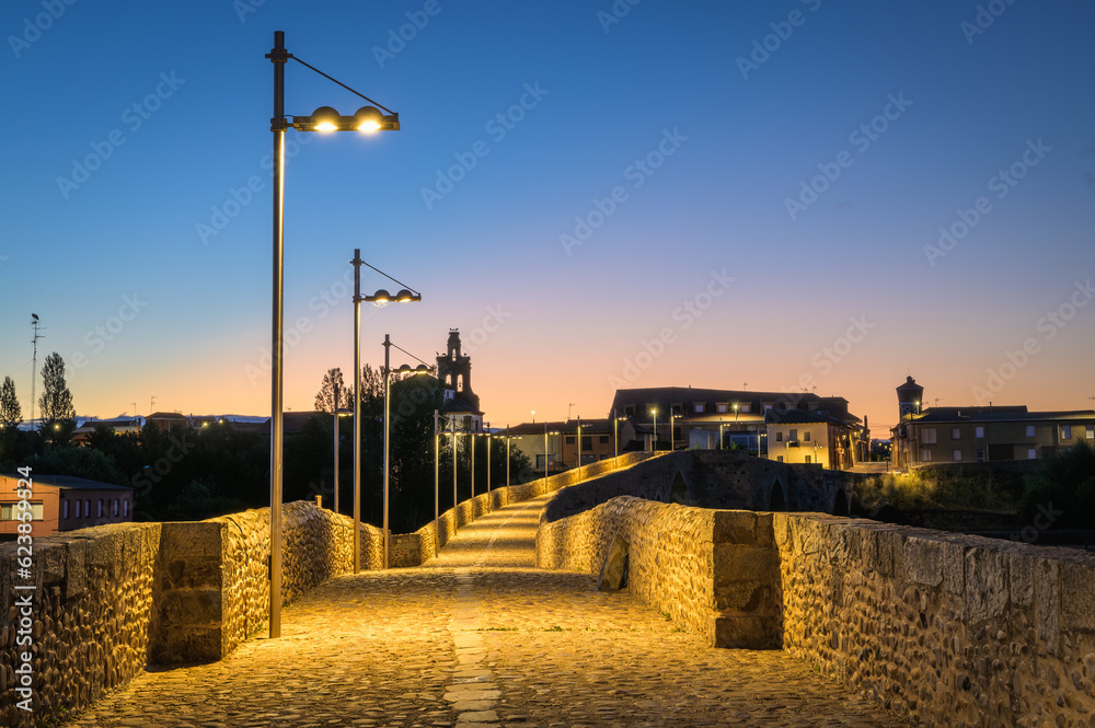 Summer's Awakening: Unveiling the Roman Bridge along the Camino de Santiago in Hospital de Orbigo, Leon, Spain