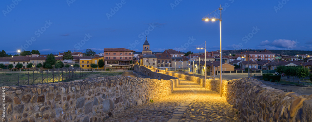 Summer's Awakening: Unveiling the Roman Bridge along the Camino de Santiago in Hospital de Orbigo, Leon, Spain