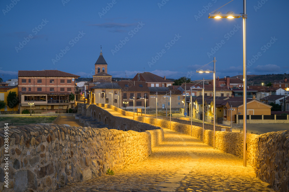 Summer's Awakening: Unveiling the Roman Bridge along the Camino de Santiago in Hospital de Orbigo, Leon, Spain