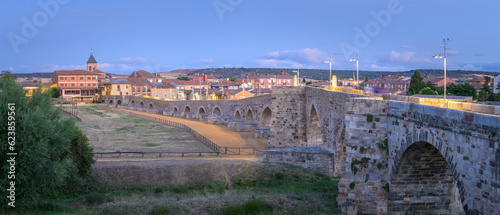 Summer's Awakening: Unveiling the Roman Bridge along the Camino de Santiago in Hospital de Orbigo, Leon, Spain