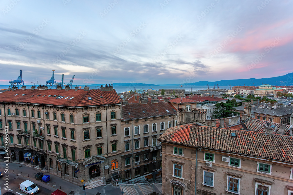 Early morning on the street of Trieste. Tiled roofs from a bird's-eye view. Trieste, Italy