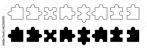 Set of puzzle pieces black and outlined. Jigsaw puzzle with pieces.  Business and marketing concept. Vector illustration. Isolated on white background.