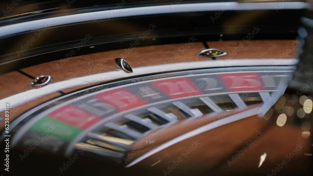 Lucky game. Close up roulette wheel at the Casino. Gambling. Close up of roulette wheel in motion. Lucky game. Close up roulette wheel at the Casino. Gambling. Close up of roulette wheel in motion.