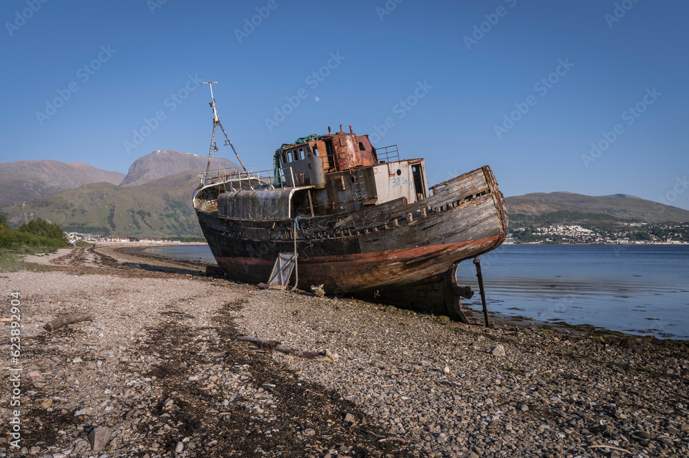 Abandoned fish trawler on the shore of Loch Linnhe.