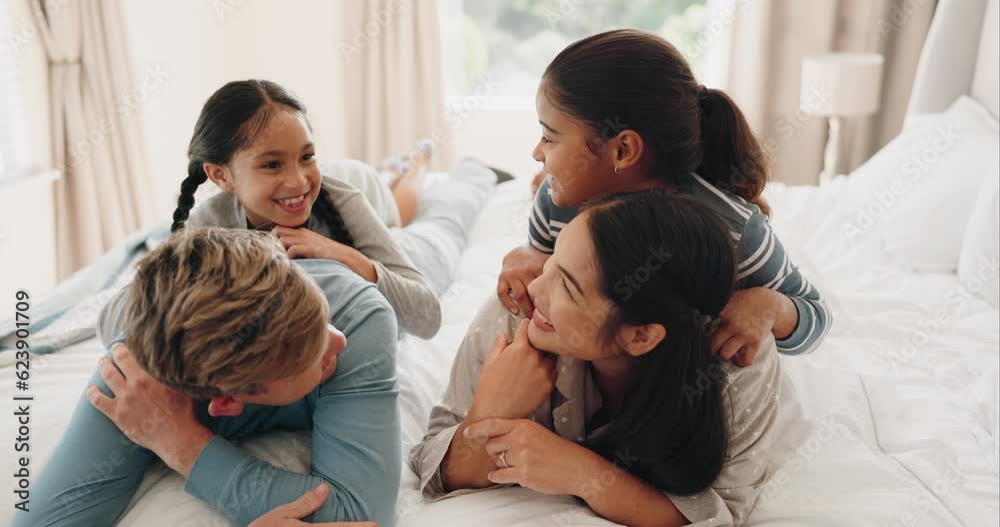 Happy family, bed and children conversation with parents in a bedroom or mother and father as bonding for happiness. Together, funny and kids with love or care for mom and dad in the morning at home Happy family, bed and children conversation with parents in a bedroom or mother and father as bonding for happiness. Together, funny and kids with love or care for mom and dad in the morning at home