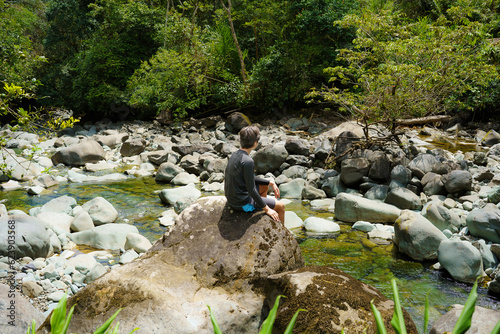person walking in the river