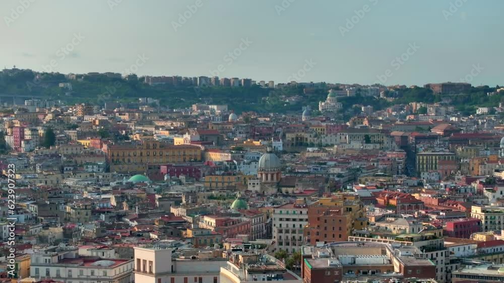 A view of Napoli, Italy, Aerial view of the historic center, panoramic drone view of the entire city of Italy. Flight over historical landmarks, narrow streets and buildings with colour rooftops A view of Napoli, Italy, Aerial view of the historic center, panoramic drone view of the entire city of Italy. Flight over historical landmarks, narrow streets and buildings with colour rooftops