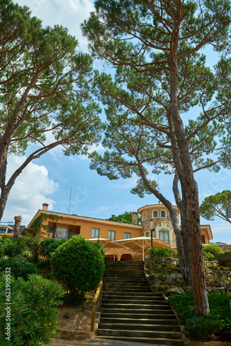 Spanish real estate of Mediterranean seashore. Yard of the beautiful luxury classical spanish villa © andreiko