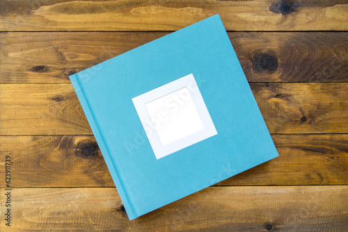 Photo album with canvas hardcover and frame for design and personalization