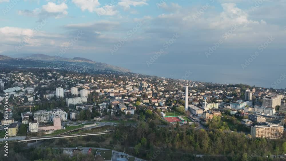 City of Lausanne in Switzerland in the evening - aerial view by drone City of Lausanne in Switzerland in the evening - aerial view by drone