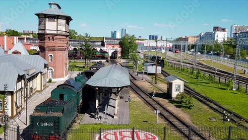 Railway workers day. Historical museum exhibition at old retro rail depot. Vintage trains and locomotives with rich history of metal industry at the outdoor station. Pan