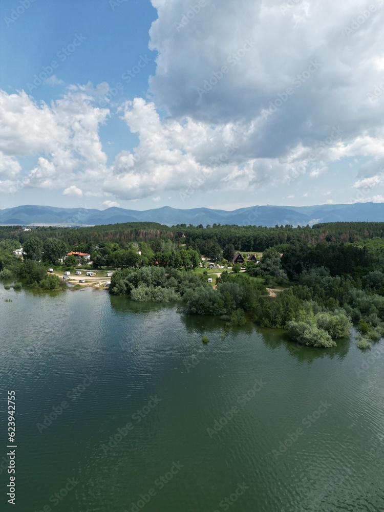 The Koprinka dam - massive reservoir (lake) near the town of Kazanlak with the Balkan mountains in the backdrop	