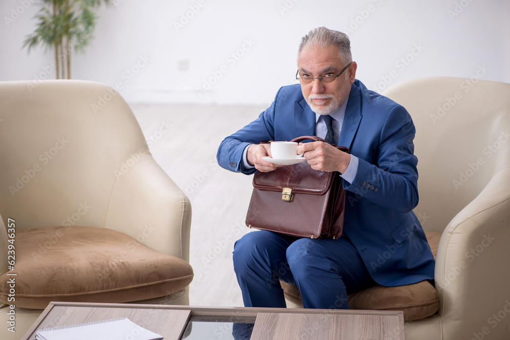 Fototapeta premium Old businessman waiting for business meeting