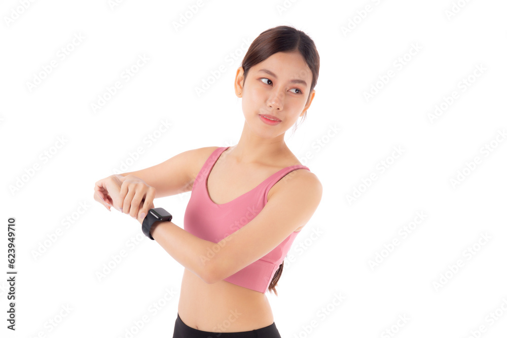 Happy young asian woman looking smartwatch for exercise and aerobics with cardio isolated on white background, female looking smart watch with wrist for pulse while workout with health, sport concept.