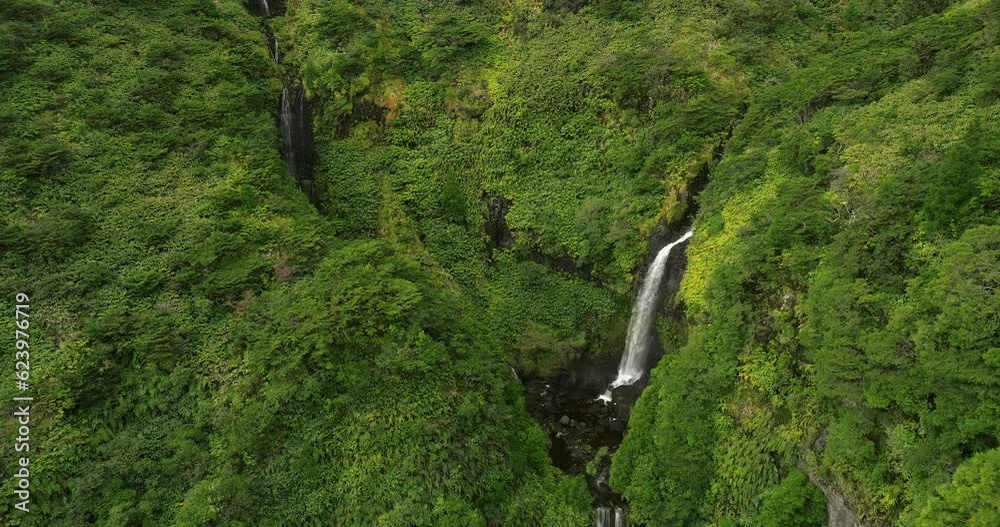 waterfalls in the forest in flores island azores aerial view