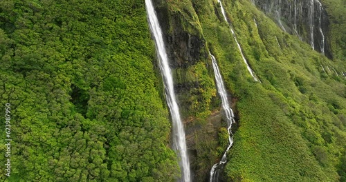 Flores island aerial view in Azores Ribeira do Ferreiro waterfalls in fog day