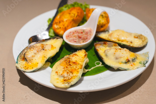 Close up of Baked Mussels with Cheese.