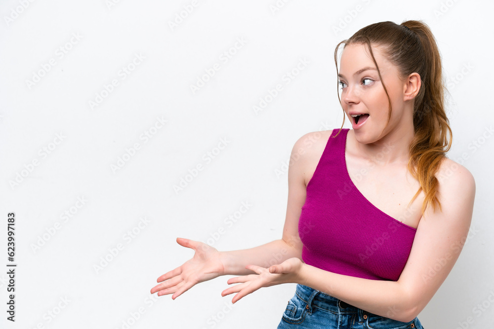 Young caucasian girl isolated on white background with surprise expression while looking side Young caucasian girl isolated on white background with surprise expression while looking side