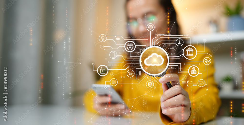 © Lila DK - Woman uploading and transferring data from smartphone to cloud computing Digital technology concept, data sheet management with large database capacity and high security. person blur, hand focus. © Lila DK - Woman uploading and transferring data from smartphone to cloud computing Digital technology concept, data sheet management with large database capacity and high security. person blur, hand focus.