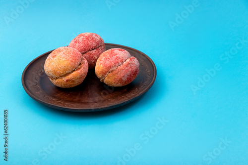 Food, donuts, sweets, custard, on a clean background, blue, banner, peach, pastries, decorative pastries, sweet, tasty, on a plate, on a plate