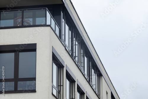 facade of a modern office building with many windows © Ulrich