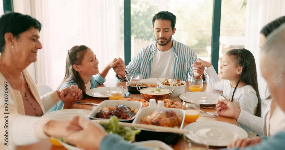 Children, parents and grandparents praying at thanksgiving together as a family for bonding or eating food in celebration. Love, lunch or brunch with kids and relatives saying grace in a dining room Children, parents and grandparents praying at thanksgiving together as a family for bonding or eating food in celebration. Love, lunch or brunch with kids and relatives saying grace in a dining room