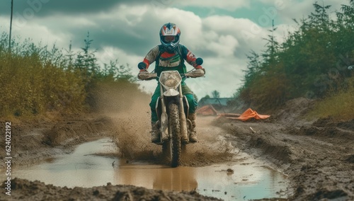 motocross, motorcycle crossing rough terrain