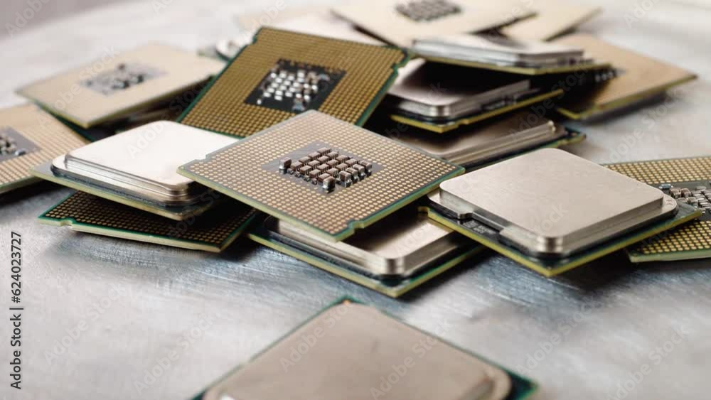  CPU Processor Microchip. Older processors fall on metal surface. concept of computer