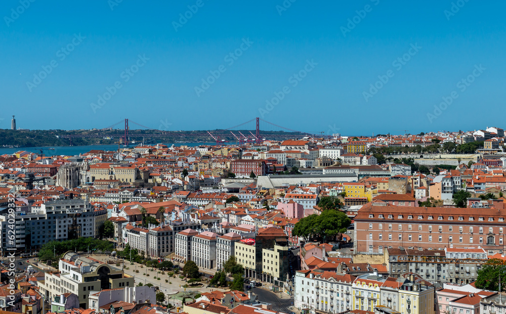 Lisbon. Portugal- 07.09.2023. Panoramic view of the capital from Alfama with a view of the 25th April Bridge.