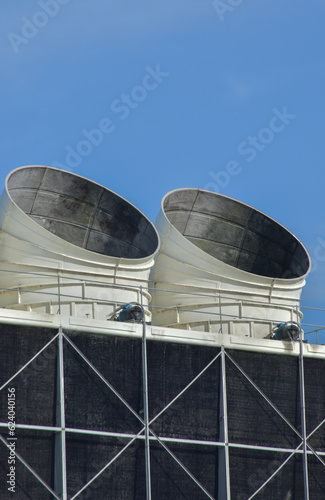  Air conditioning pipes, Cooling Tower 2, an industrial area, an airport cooling tower, with a blue sky as the background