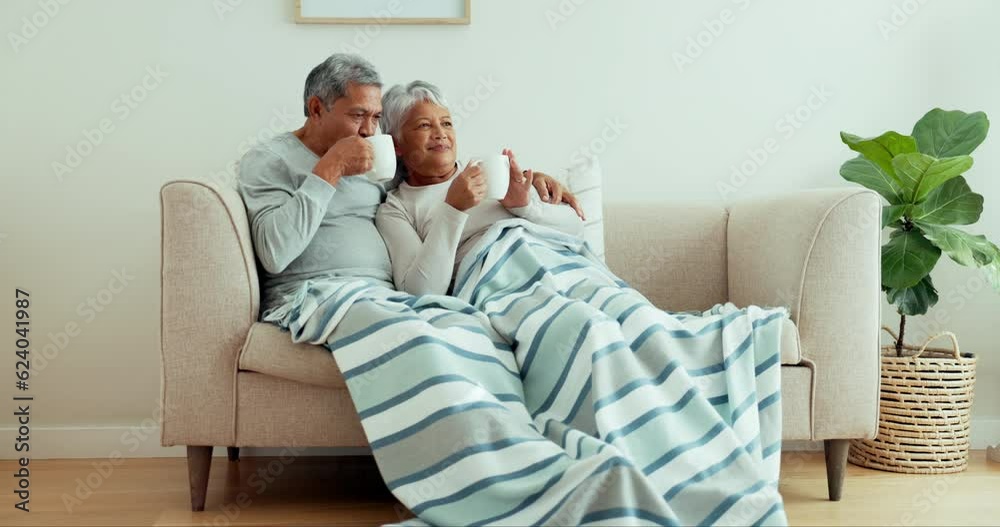 Senior couple, relax and drinking coffee on sofa with home living room blanket for love, bonding and morning routine. Smile, woman or happy elderly man with tea cup beverage on retirement house couch Senior couple, relax and drinking coffee on sofa with home living room blanket for love, bonding and morning routine. Smile, woman or happy elderly man with tea cup beverage on retirement house couch