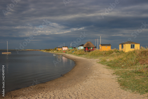 Colorful beach houses at Eriks Hale in Marstal on the Danish island of Ærø. photo