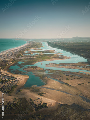Aerial view of the sea, beach and river knowned as Ria formosa © Alexandre Mestre