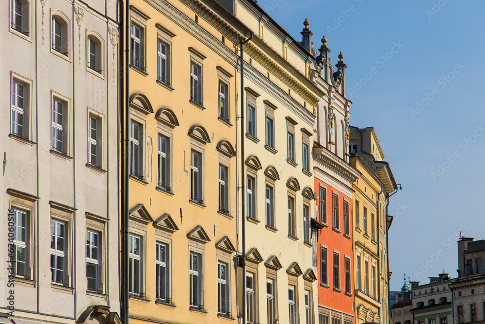 Facade of historic buildings in the old town of Krakow, Poland