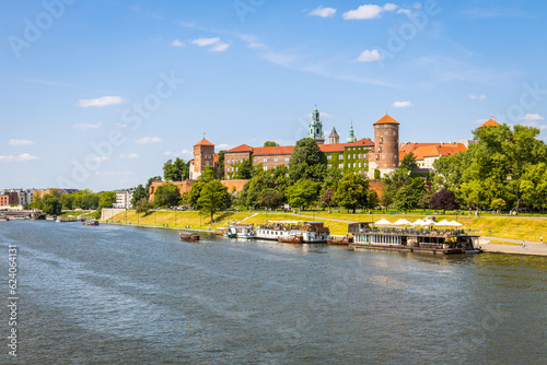 Krakow, Poland with Wawel castle and Wisła river on a beautiful summer day photo