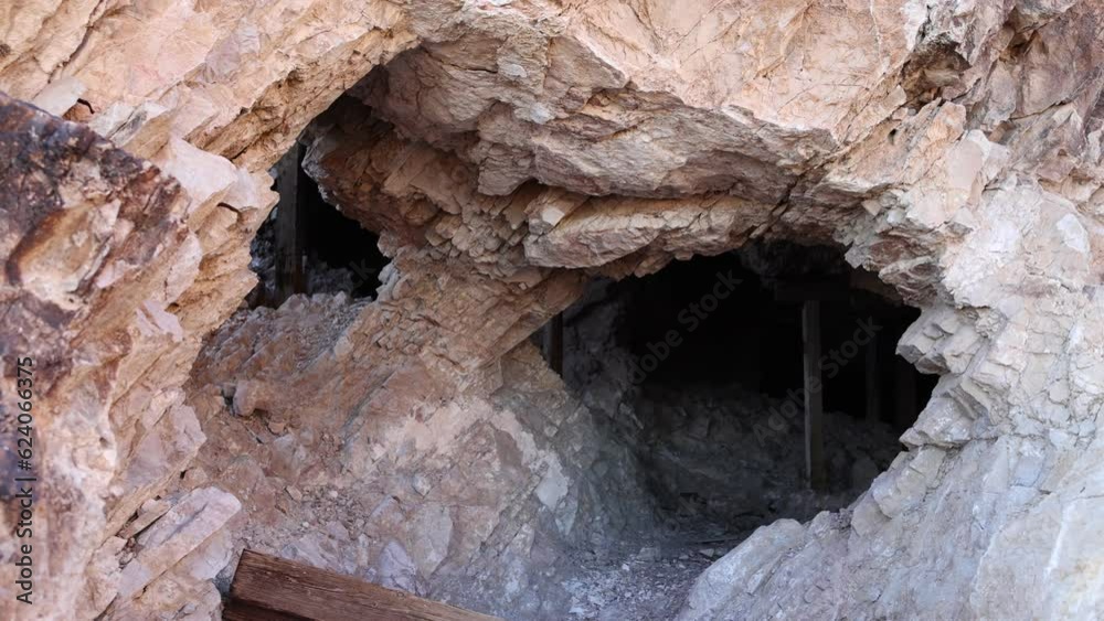 Crumbling Rock Entrance to Abandoned Mine with Timber Supports - Shallow Depth of Field Crumbling Rock Entrance to Abandoned Mine with Timber Supports - Shallow Depth of Field