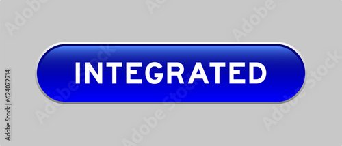 Blue color capsule shape button with word integrated on gray background