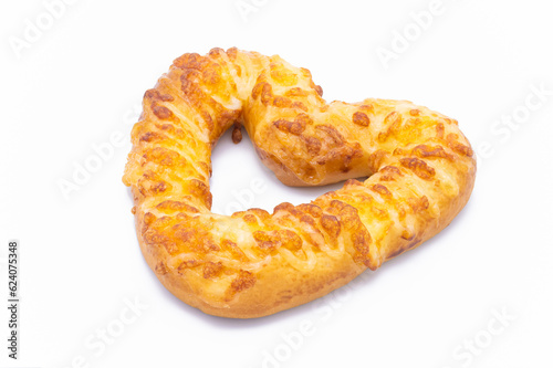 heart shaped bread with mayonnaise on white background closeup