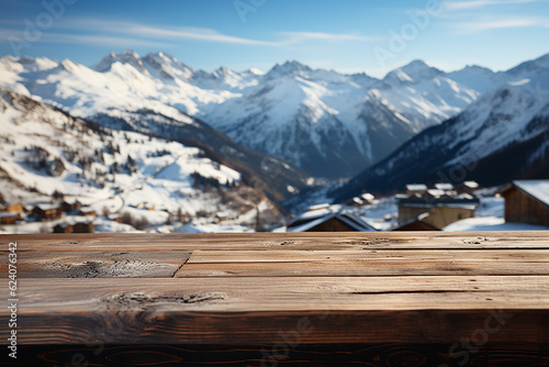 Wooden table with mountain and snow background