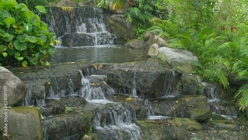 Waterfalls over rocks and ponds