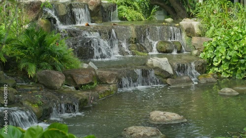 Waterfalls over rocks and ponds