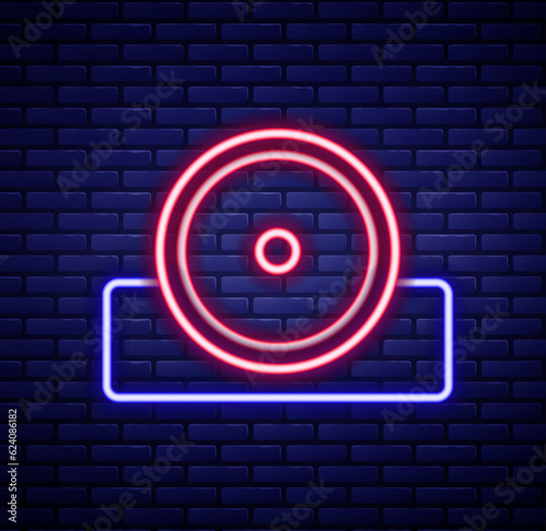 Glowing neon line Otolaryngological head reflector icon isolated on brick wall background. Equipment for inspection the patients ear, throat and nose. Colorful outline concept. Vector