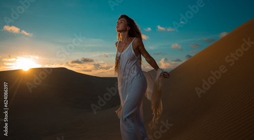 Woman on desert tour in sunset in Vietnam