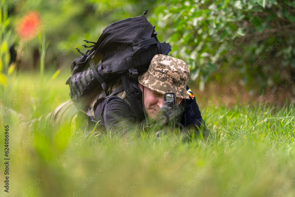 Soldier or mercenary aiming while prone