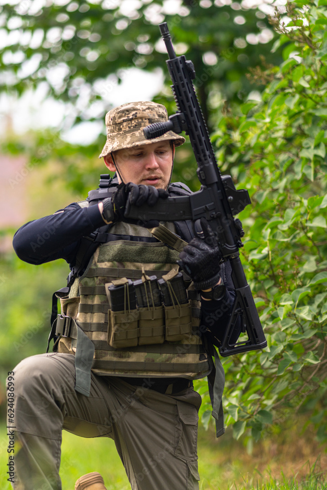 Soldier reloading his rifle