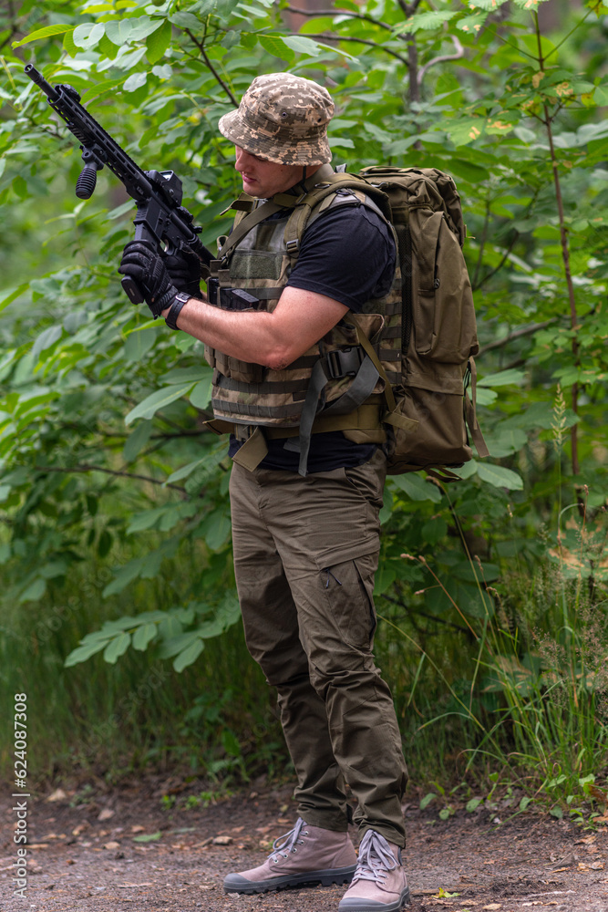 Loading a magazine with cartridges in an automatic rifle