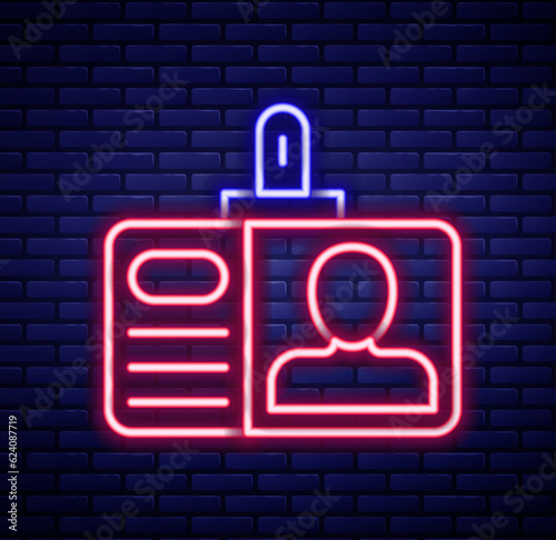 Glowing neon line Identification badge icon isolated on brick wall background. It can be used for presentation, identity of the company, advertising. Colorful outline concept. Vector