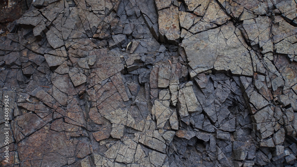 Basalt volcanic rock with cracks Basalt volcanic rock with cracks