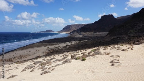 Cape verde  Island of Sao Vicente. View on sea on the north side of the island with blue sea  clouds and black vulcanic rocks.