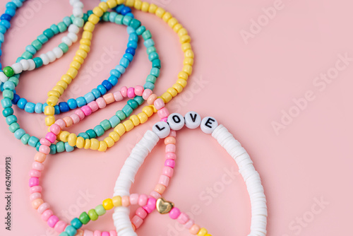 Wallpaper Mural Kids handmade beaded jewelry. Necklaces and bracelets made from multicolored beads and pearls. DIY bracelet beads. Children's needlework. Creativity and hobby. Art activity for kids Torontodigital.ca